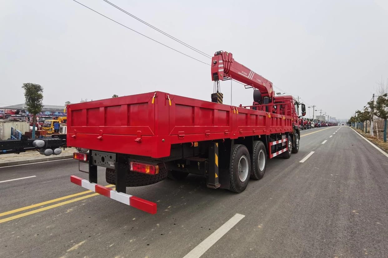 Howo TX 8×4 12 Wheelers Cargo Truck Mounted with Telescopic Crane