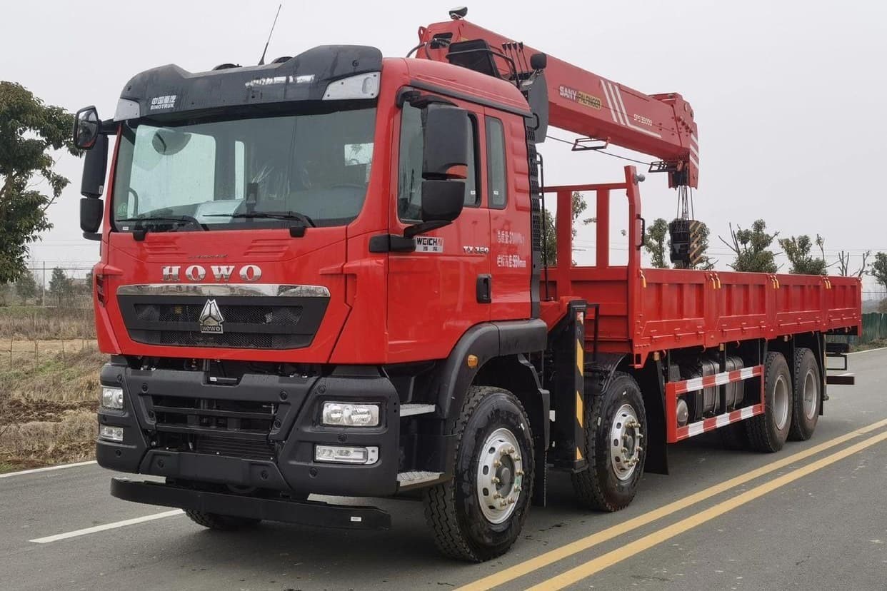 Howo TX 8x4 12 Wheelers Cargo Truck Mounted with Telescopic Crane